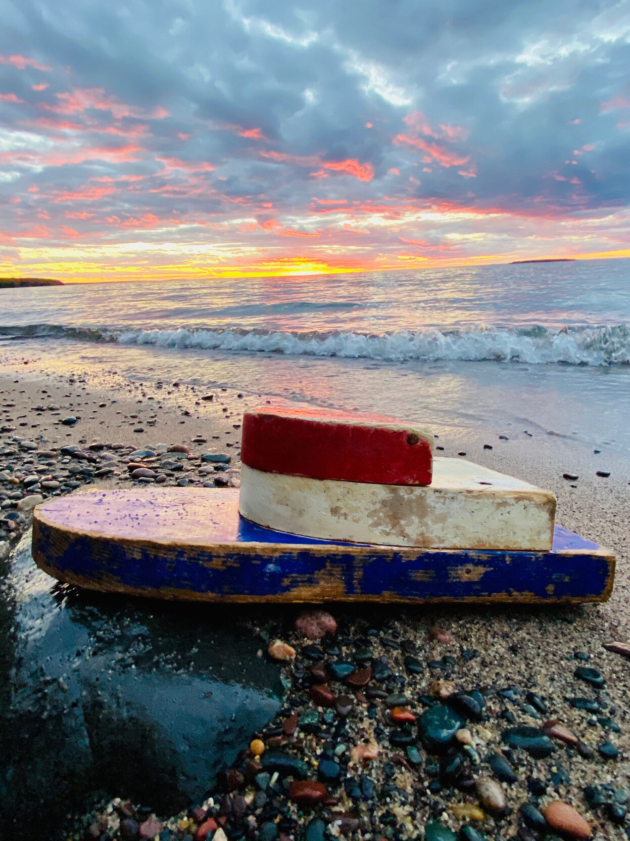 A tiny boat was discovered on a remote beach 27 years after it was launched by teachers